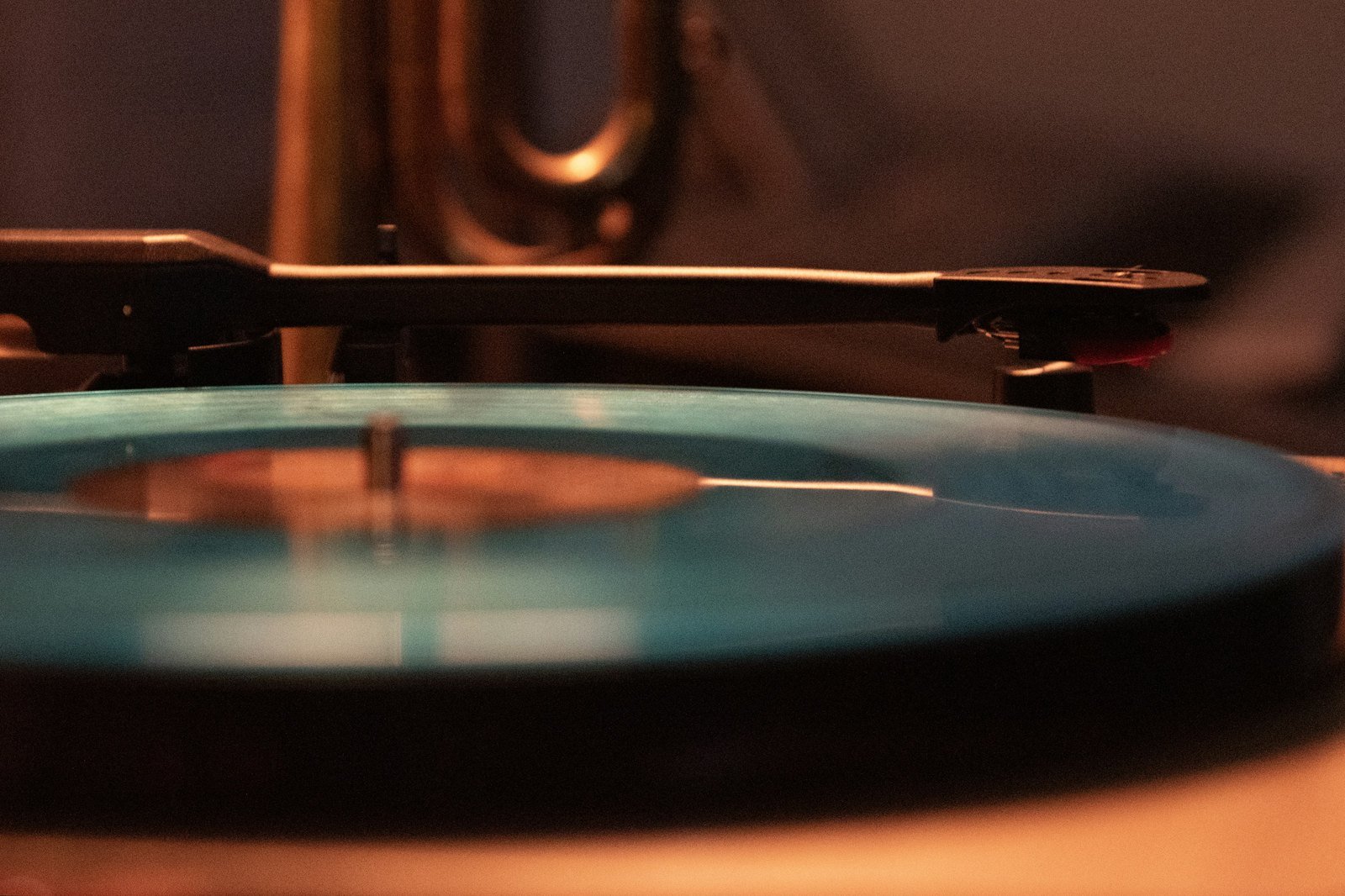 Music — a record on a turntable.
